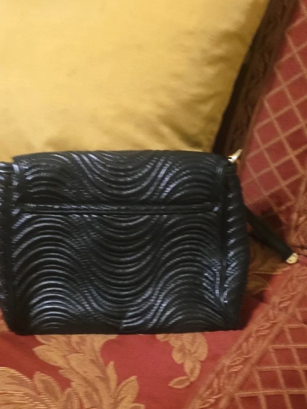 Versace sleek wristlet